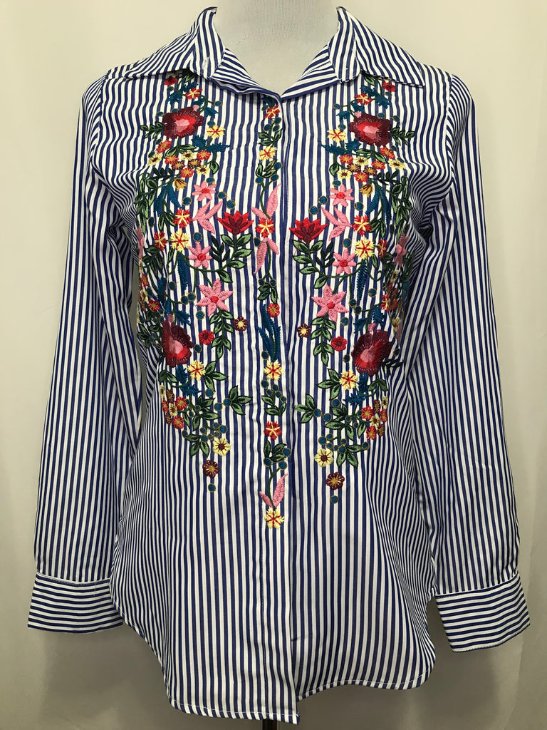 BLUSA RAYAS & FLORES T.S